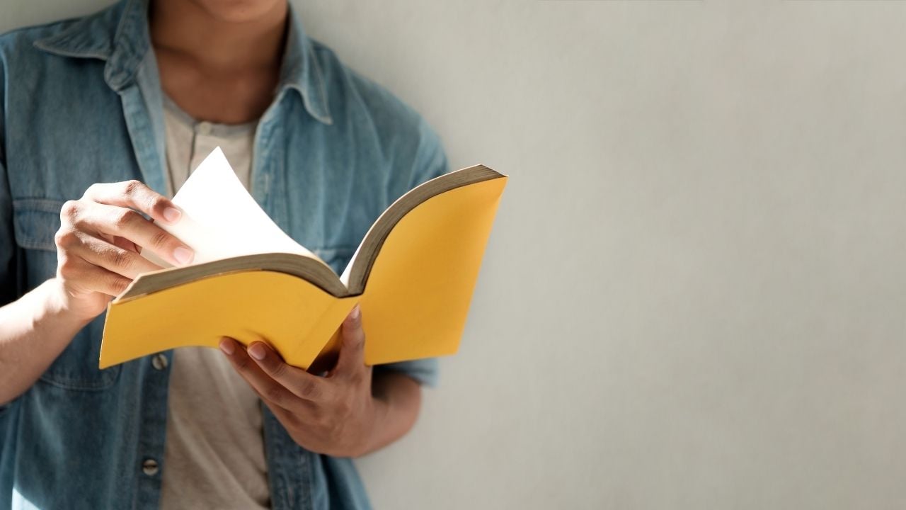man reading book